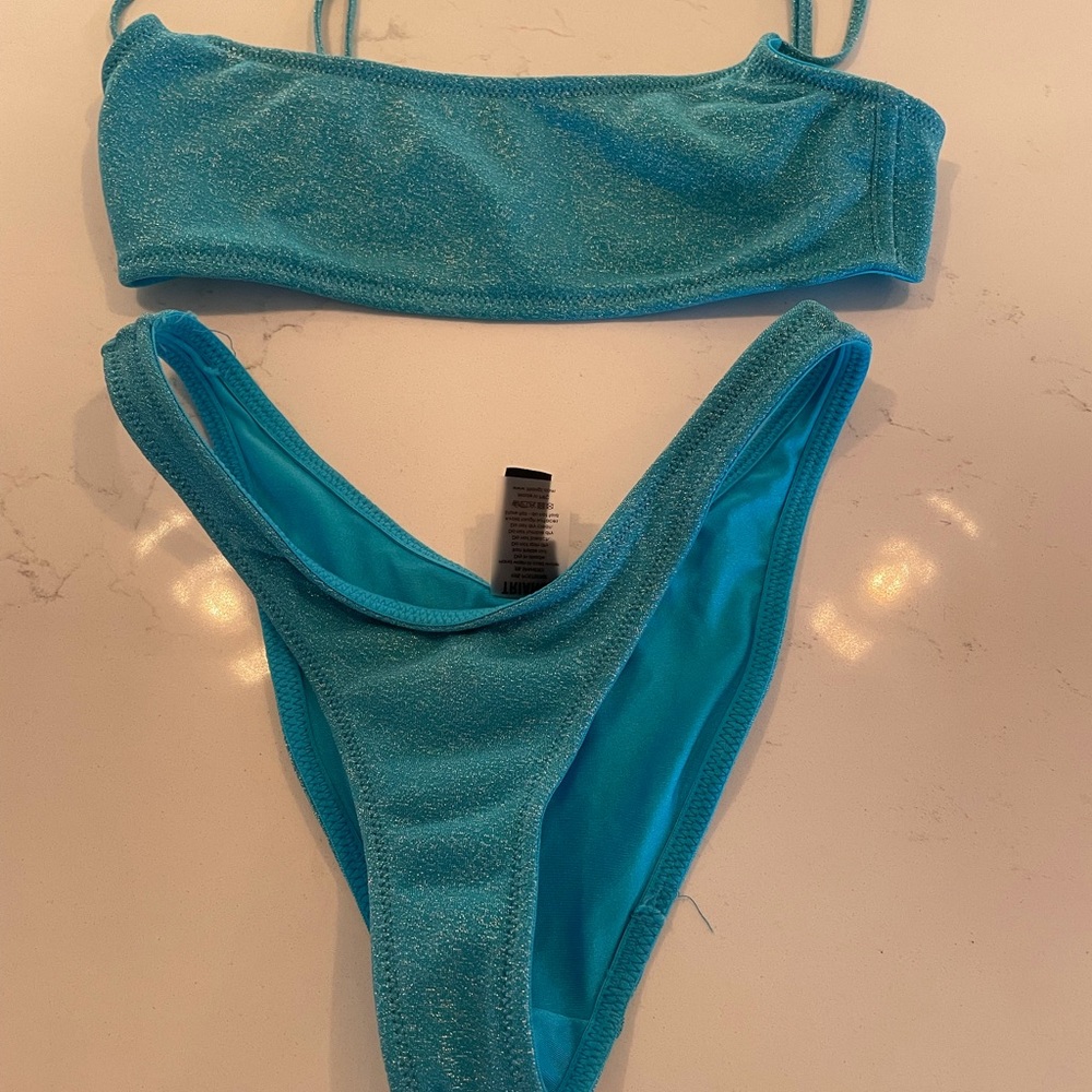 Worn once triangl set!